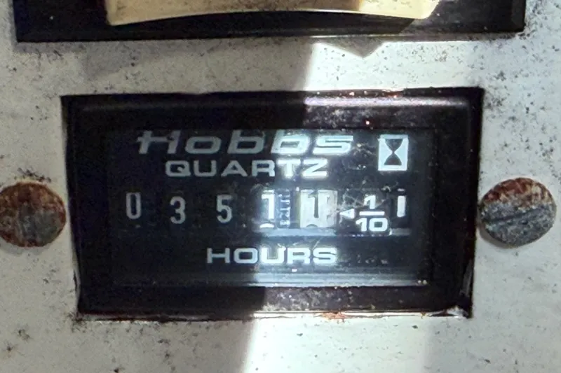 Slide: The Image of Hobbs quartz hour meter displaying 3511.1 hours on a 1995 Silverton 37 Convertible. - 46