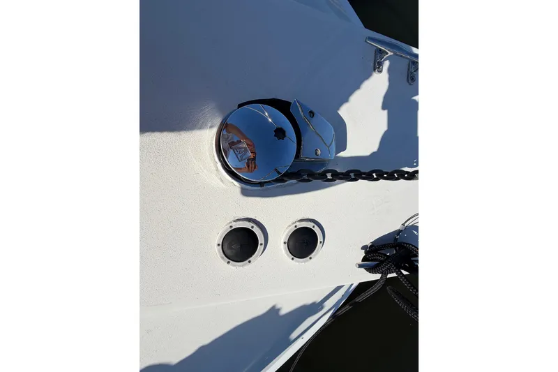 Slide: The Image of Anchor chain and winch on 1995 Silverton 37 Convertible boat deck. - 5
