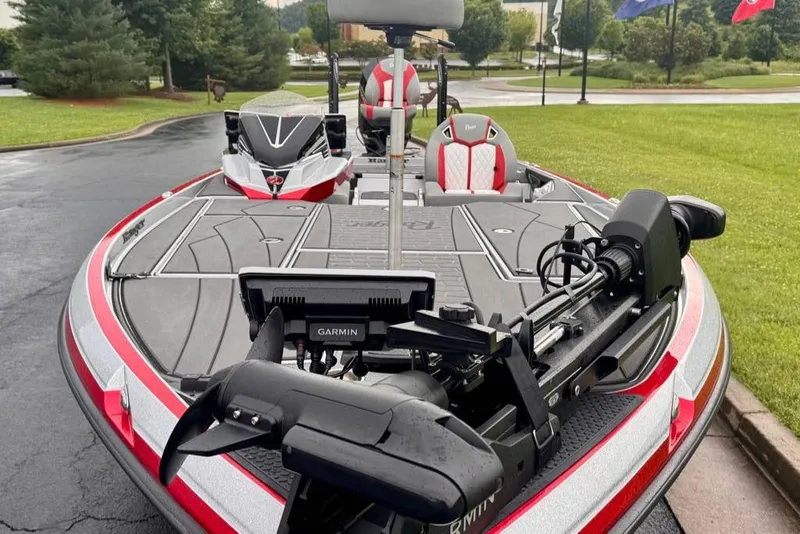 Slide: The Image of 2026 Ranger Z521R Cup-Equipped boat with advanced Garmin technology, parked on a wet driveway. - 26