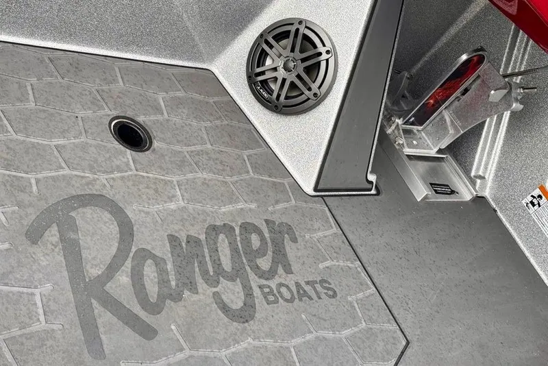 Slide: The Image of 2026 Ranger Z521R Cup-Equipped boat interior with speaker and branded flooring. - 37