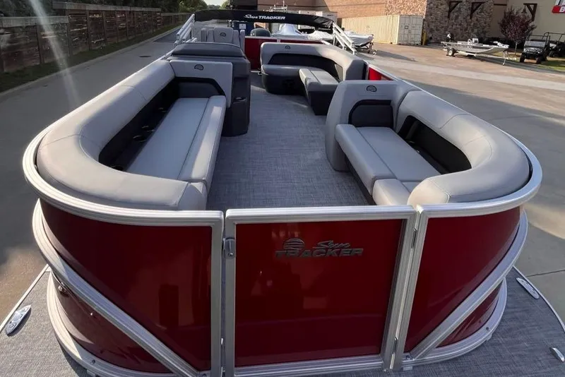Slide: The Image of 2026 Sun Tracker Party Barge 18 DLX pontoon boat with spacious seating and sleek design. - 2