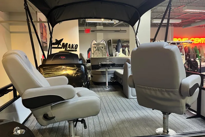 Slide: The Image of Interior of 2026 Ranger 220F boat with comfortable seating and modern design. - 6