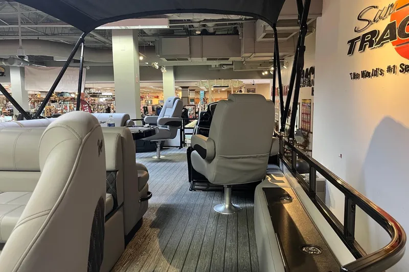 Slide: The Image of Interior view of 2026 Ranger 220F boat with plush seating and modern design. - 7