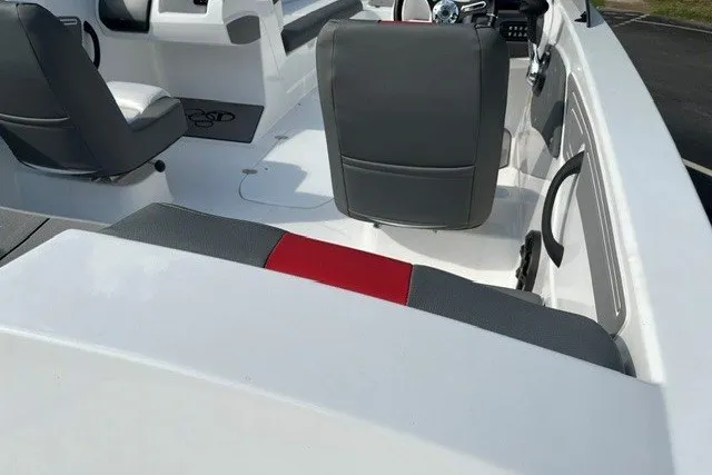 Slide: The Image of 2026 Tahoe T21 boat interior with gray and red seating, modern design. - 13