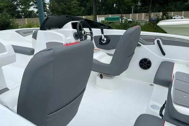 Slide: The Image of Interior of 2026 Tahoe T21 boat with modern seating and steering console. - 6