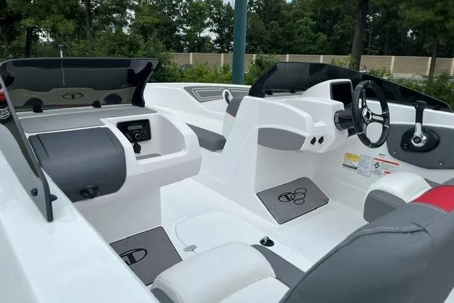 Slide: The Image of Interior of a 2026 Tahoe T21 boat, featuring sleek design and modern controls. - 3