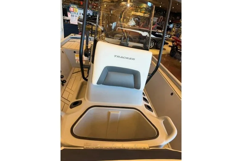 Slide: The Image of 2026 Tracker Bass Tracker Classic CC boat interior with console and seating. - 8