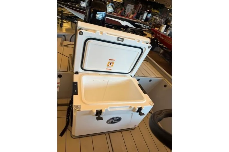 Slide: The Image of Open cooler on 2026 Tracker Bass Tracker Classic CC boat deck in showroom. - 9