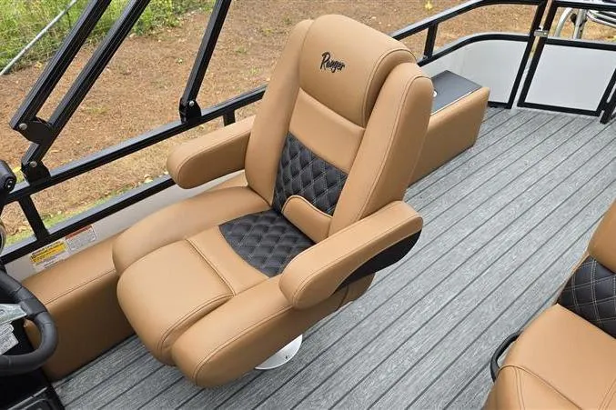 Slide: The Image of Luxurious tan and black seating on 2026 Ranger 220F boat deck. - 12