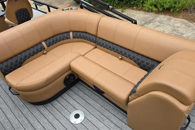 Slide: The Image of Luxurious tan seating on 2026 Ranger 220F boat, featuring quilted accents and modern design. - 14