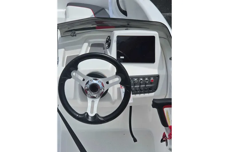 Slide: The Image of Steering console of 2026 Tahoe T16 boat with modern controls and display screen. - 10