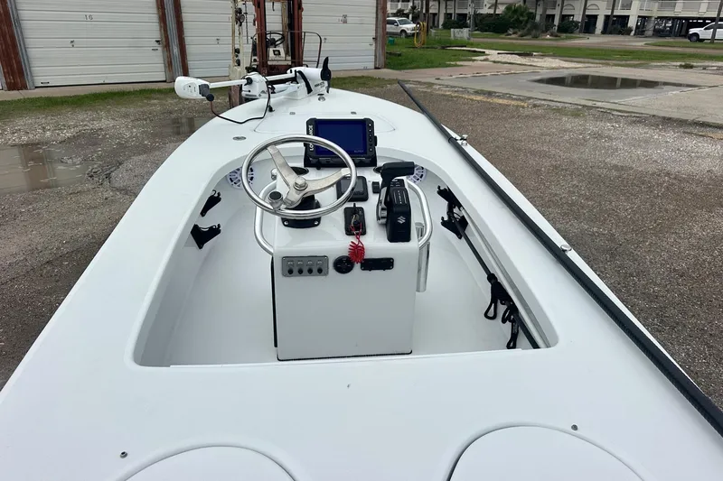 Slide: The Image of 2024 Ankona Advent boat interior with steering wheel and control panel. - 5