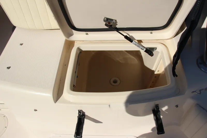 Slide: The Image of Open storage compartment on a 2005 Grady-White Express 330 boat. - 23