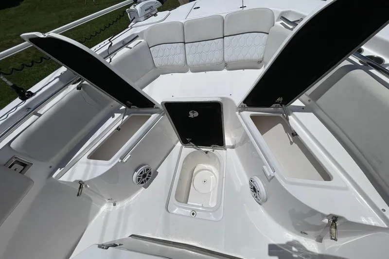 Slide: The Image of Interior view of 2022 Sea Fox 288 Commander with open storage compartments. - 15