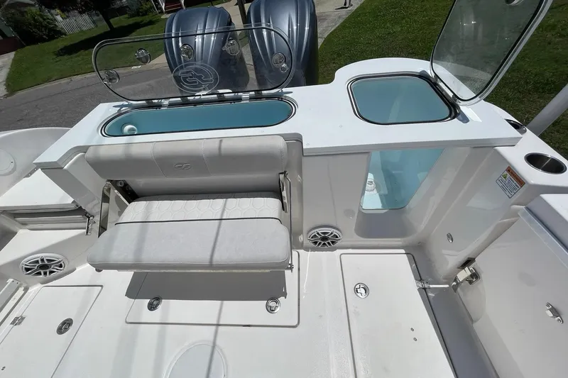 Slide: The Image of FLIP-UP AFT COCKPIT SEATING WITH BACKREST THAT DOUBLES AS A BOLSTER WHEN SEAT IS FLIPPED DOWN - 32