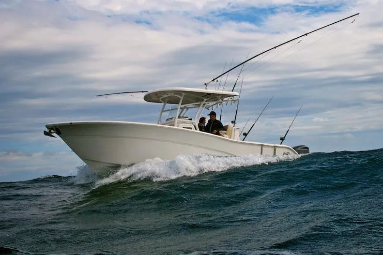 Slide: The Image of Manufacturer Provided Image: 2022 Sea Fox 288 Commander boat navigating ocean waves. - 77