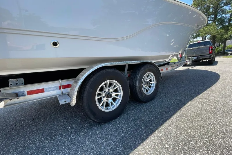 Slide: The Image of WHEELS, TIRES, AND BEARINGS ALL IN GOOD SHAPE WITH LOW TIME - 87