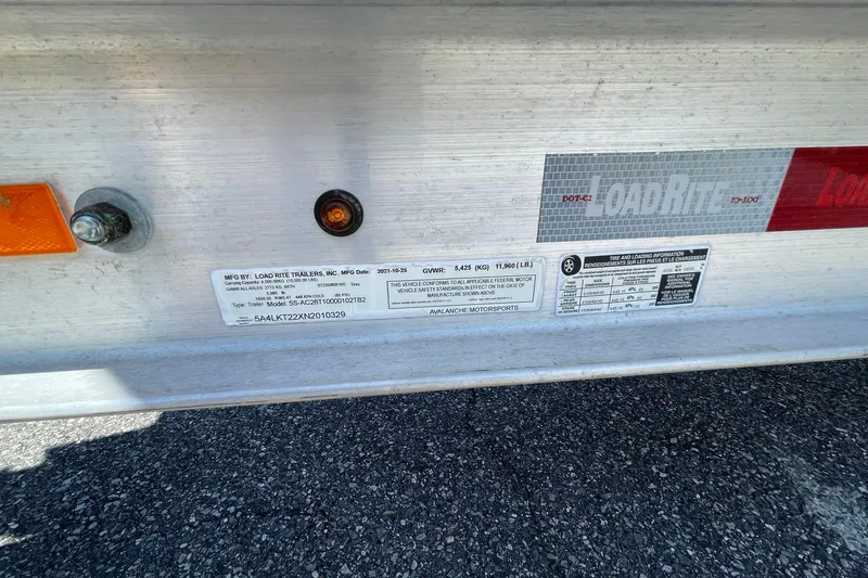 Slide: The Image of Trailer label on Load Rite trailer, showing specifications and manufacturing details. - 88