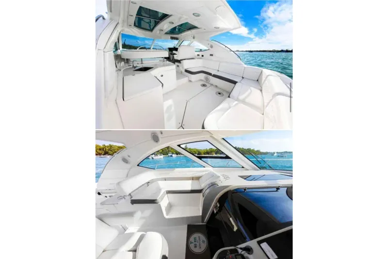 Slide: The Image of 2009 Sea Ray 43 Sundancer yacht interior with sleek white seating and panoramic windows. - 7
