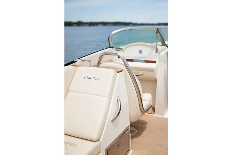 Slide: The Image of 2022 Chris Craft 34 Launch Heritage boat interior with elegant seating and lake view. - 20
