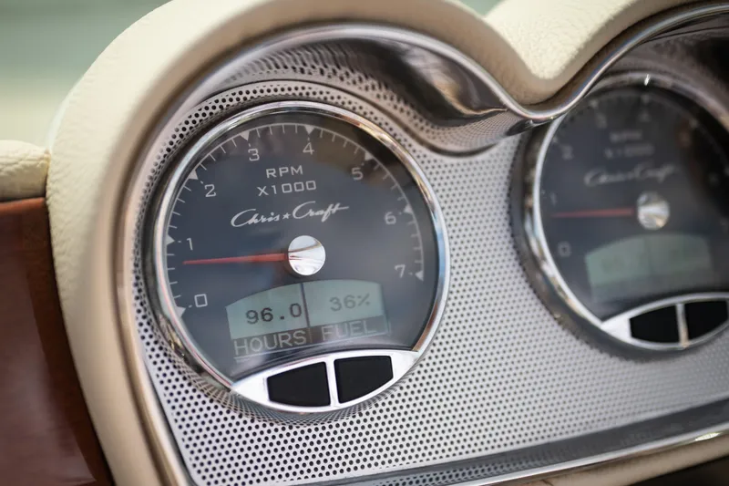 Slide: The Image of Close-up of 2022 Chris Craft 34 Launch Heritage dashboard gauges. - 23