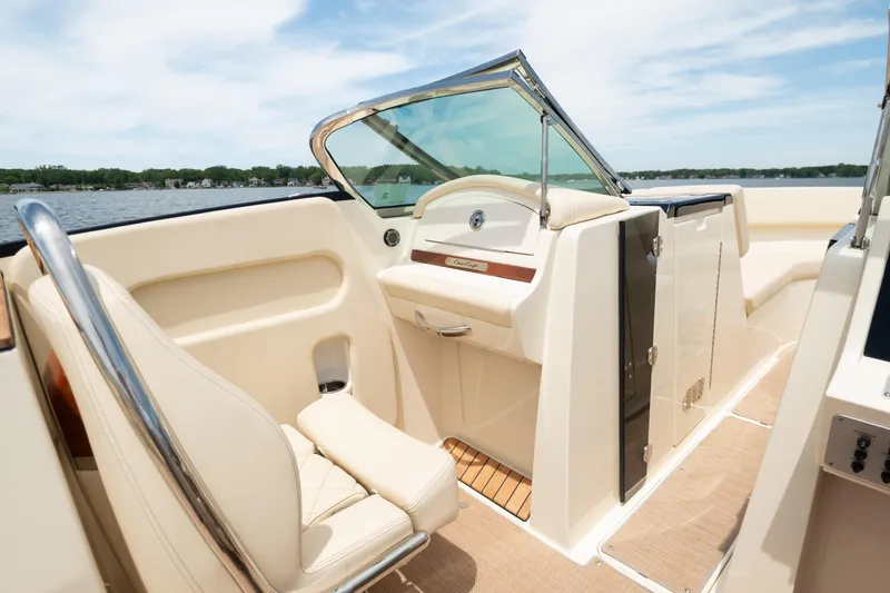 Slide: The Image of 2022 Chris Craft 34 Launch Heritage boat interior with luxurious seating and elegant design. - 27