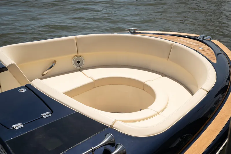 Slide: The Image of Luxurious seating on 2022 Chris Craft 34 Launch Heritage boat, featuring elegant design and craftsmanship. - 31
