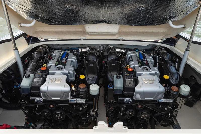 Slide: The Image of Twin V8 engines in a 2022 Chris Craft 34 Launch Heritage boat. - 35