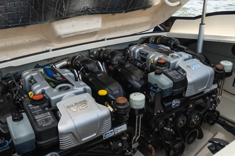 Slide: The Image of Engine compartment of 2022 Chris Craft 34 Launch Heritage boat, featuring dual V8 engines. - 36