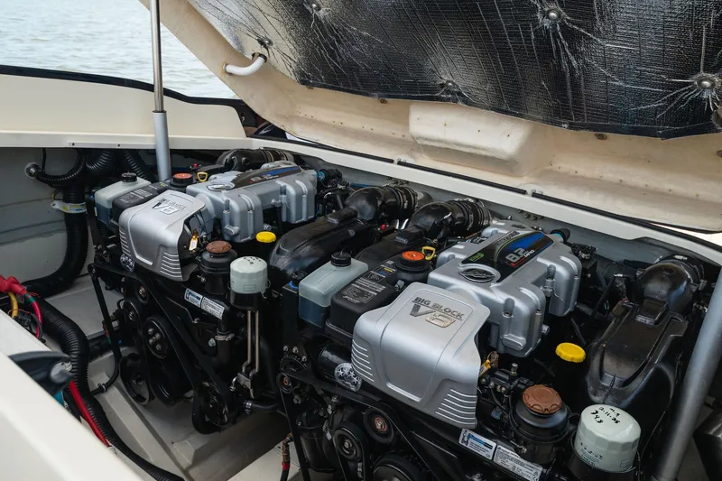 Slide: The Image of 2022 Chris Craft 34 Launch Heritage boat engine compartment with dual engines. - 37