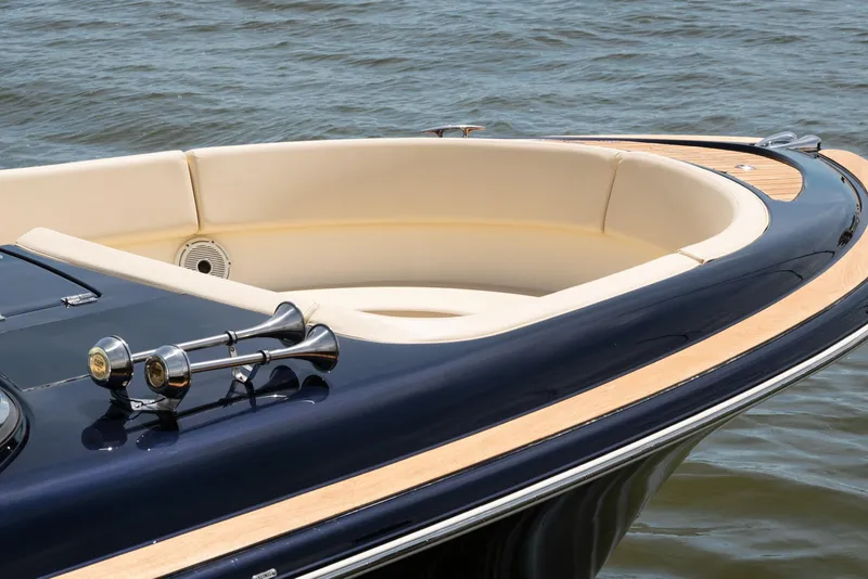 Slide: The Image of 2022 Chris Craft 34 Launch Heritage boat with elegant seating and polished wood accents. - 7