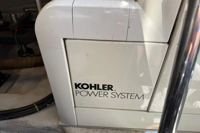 Slide: The Image of Kohler Power System in 1999 Carver 450 Voyager Pilothouse engine room. - 22