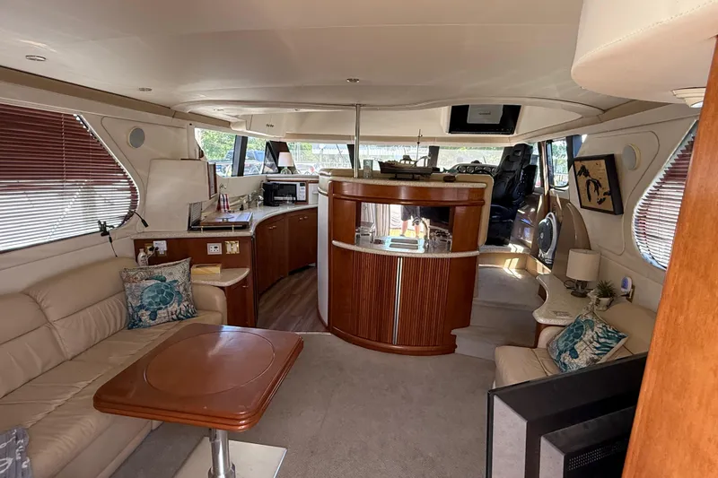 Slide: The Image of Luxurious interior of a 1999 Carver 450 Voyager Pilothouse yacht with elegant furnishings. - 25