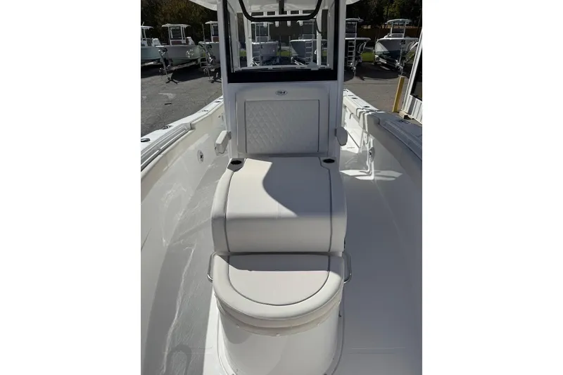 Slide: The Image of 2026 Sea Hunt Ultra 285 Coffin Box boat interior, featuring spacious seating and sleek design. - 4
