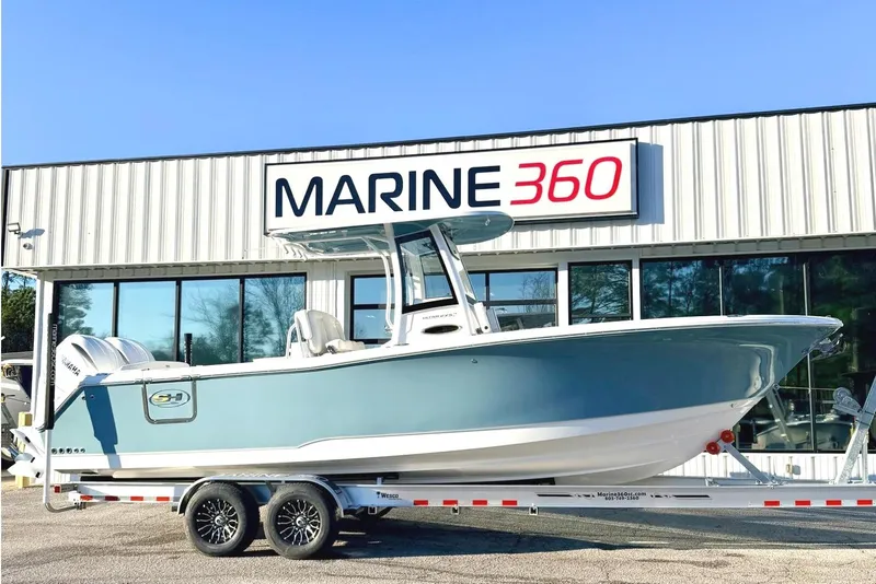 The Image of 2026 Sea Hunt Ultra 275 Coffin Box boat on trailer at Marine 360 dealership. - 0