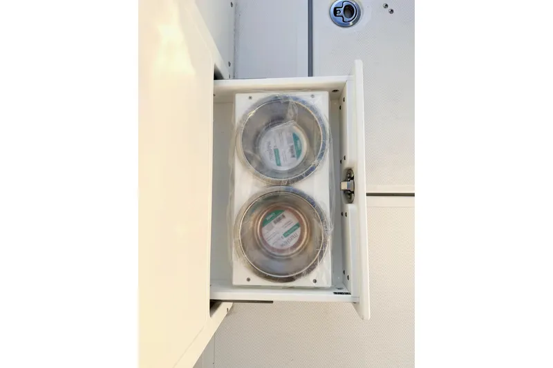 Slide: The Image of Interior view of 2026 Sea Hunt Ultra 275 Coffin Box storage compartment. - 18