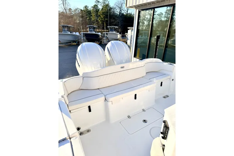 Slide: The Image of 2026 Sea Hunt Ultra 275 Coffin Box boat interior with cushioned seating. - 20