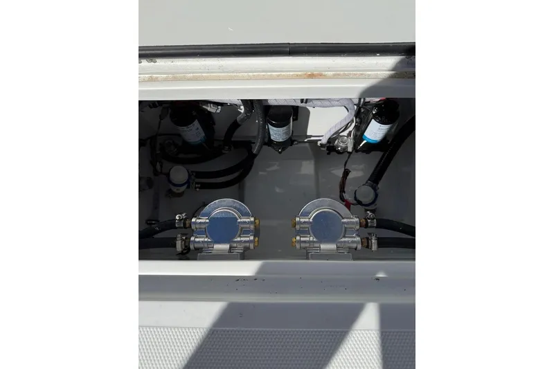 Slide: The Image of 2026 Sea Hunt Ultra 275 Coffin Box boat interior components and wiring. - 17