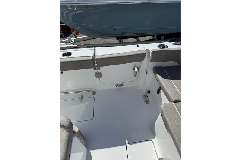 Slide: The Image of Interior view of 2026 Sea Hunt Ultra 275 Coffin Box boat, featuring seating and storage. - 31