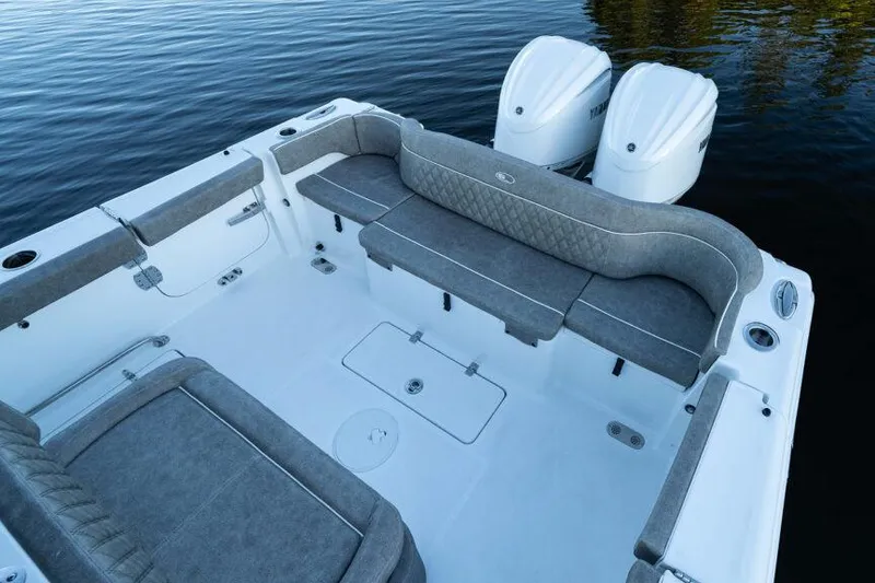 Slide: The Image of Manufacturer Provided Image: 2026 Sea Hunt Ultra 275 Coffin Box boat interior with dual engines on calm water. - 41