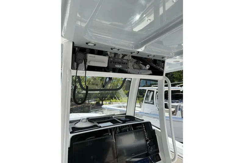 Slide: The Image of 2026 Sea Hunt Ultra 275 Coffin Box boat console with advanced navigation equipment. - 9