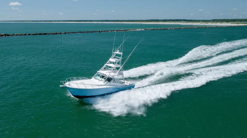Slide: The Image of 2019 Albemarle 410 Express Fisherman cruising on open water. - 10