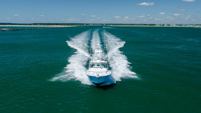Slide: The Image of 2019 Albemarle 410 Express Fisherman cruising on open water. - 11