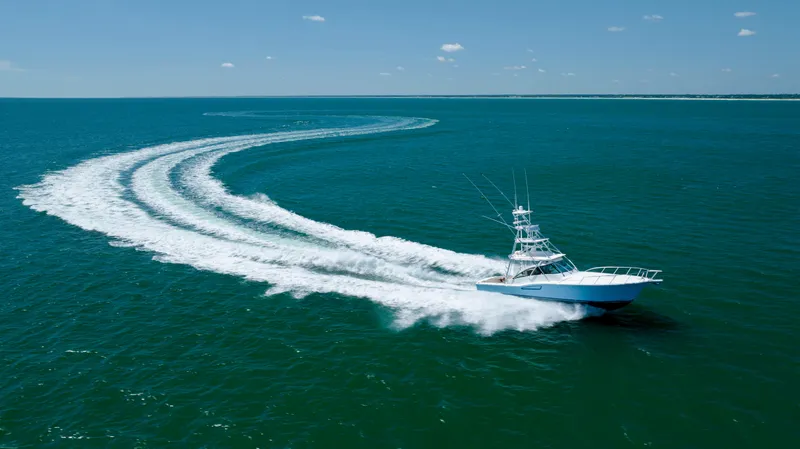 Slide: The Image of 2019 Albemarle 410 Express Fisherman cruising on open water. - 19