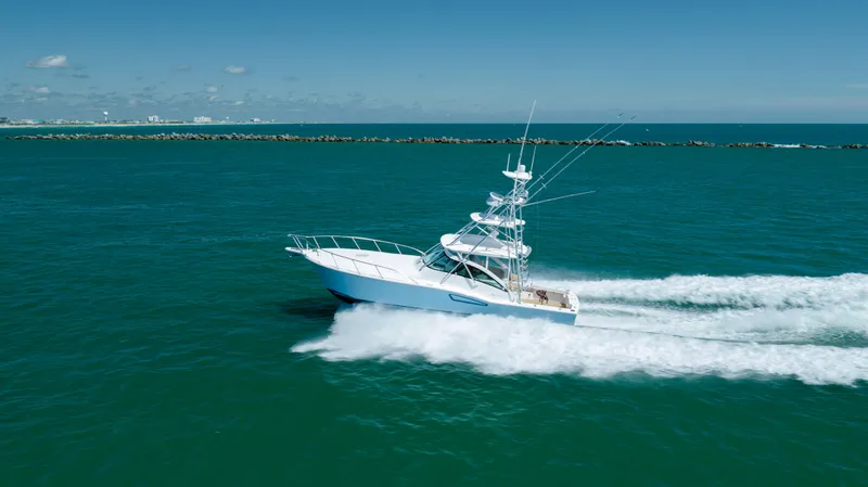 Slide: The Image of 2019 Albemarle 410 Express Fisherman cruising on open water. - 21