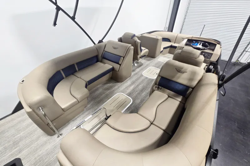 Slide: The Image of Luxurious interior of 2026 Bennington 23 L pontoon boat with plush seating and modern design. - 10