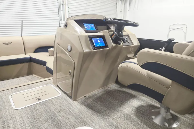 Slide: The Image of 2026 Bennington 23 L boat interior with modern dashboard and comfortable seating. - 6