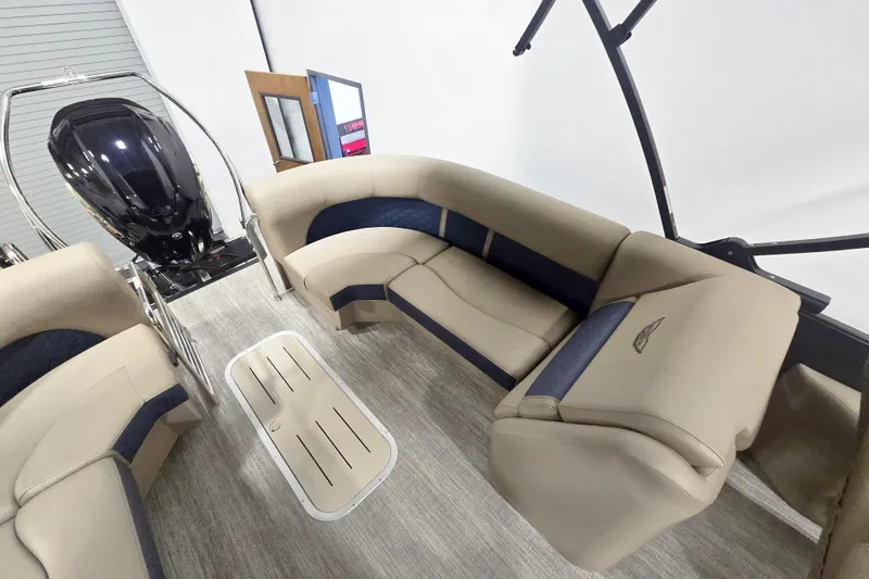 Slide: The Image of Interior of 2026 Bennington 23 L pontoon boat with plush seating and modern design. - 9
