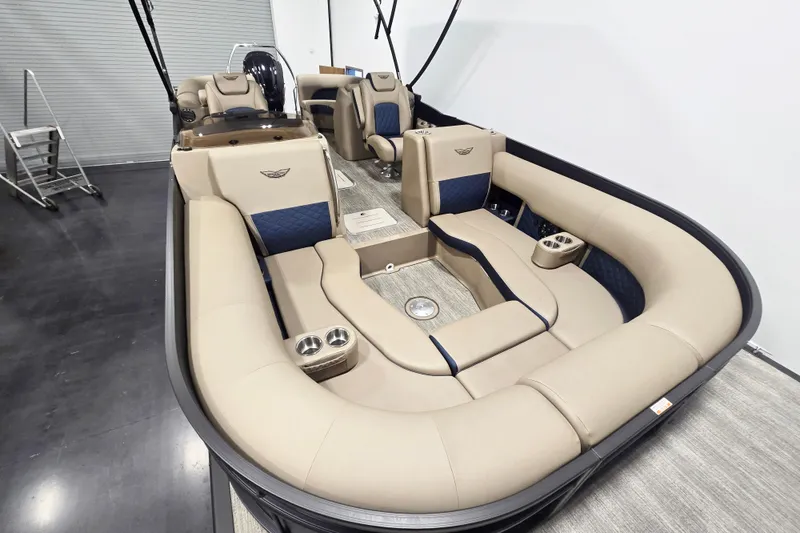 Slide: The Image of Luxurious interior of 2026 Bennington 23 L pontoon boat with plush seating and cup holders. - 8