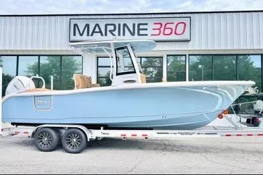 The Image of 2026 Sea Hunt Ultra 255 SE boat on trailer at Marine 360 dealership. - 0